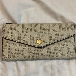 NEW Michael Kors, with detachable coin wallet.